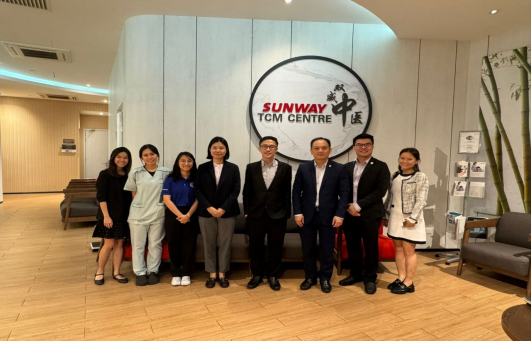 Group photo with Dr. Lim's team at Sunway TCM Centre.
